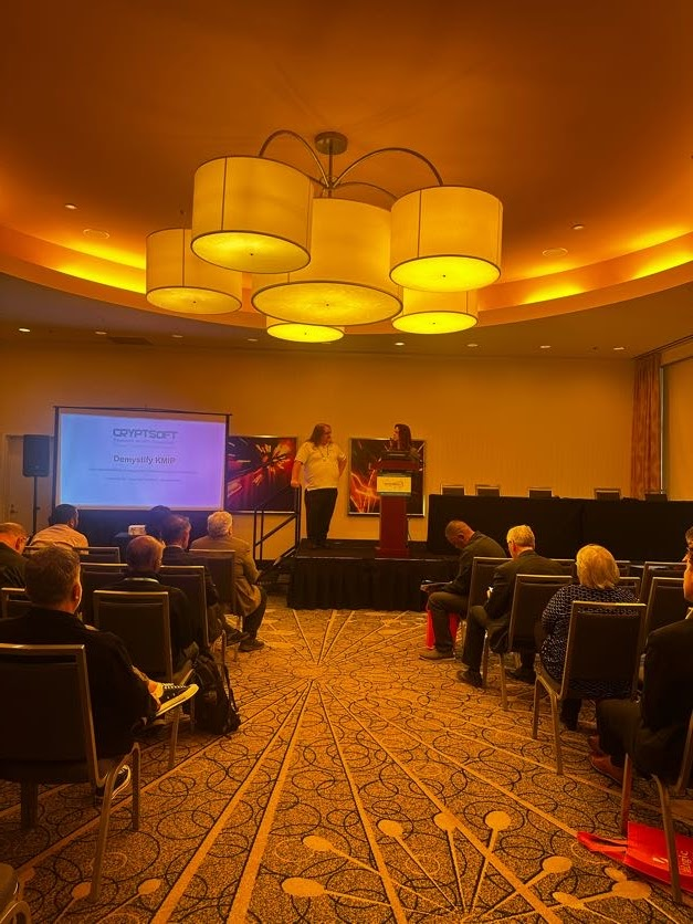 Tim and co-presenter onstage with the Demystify KMIP slide